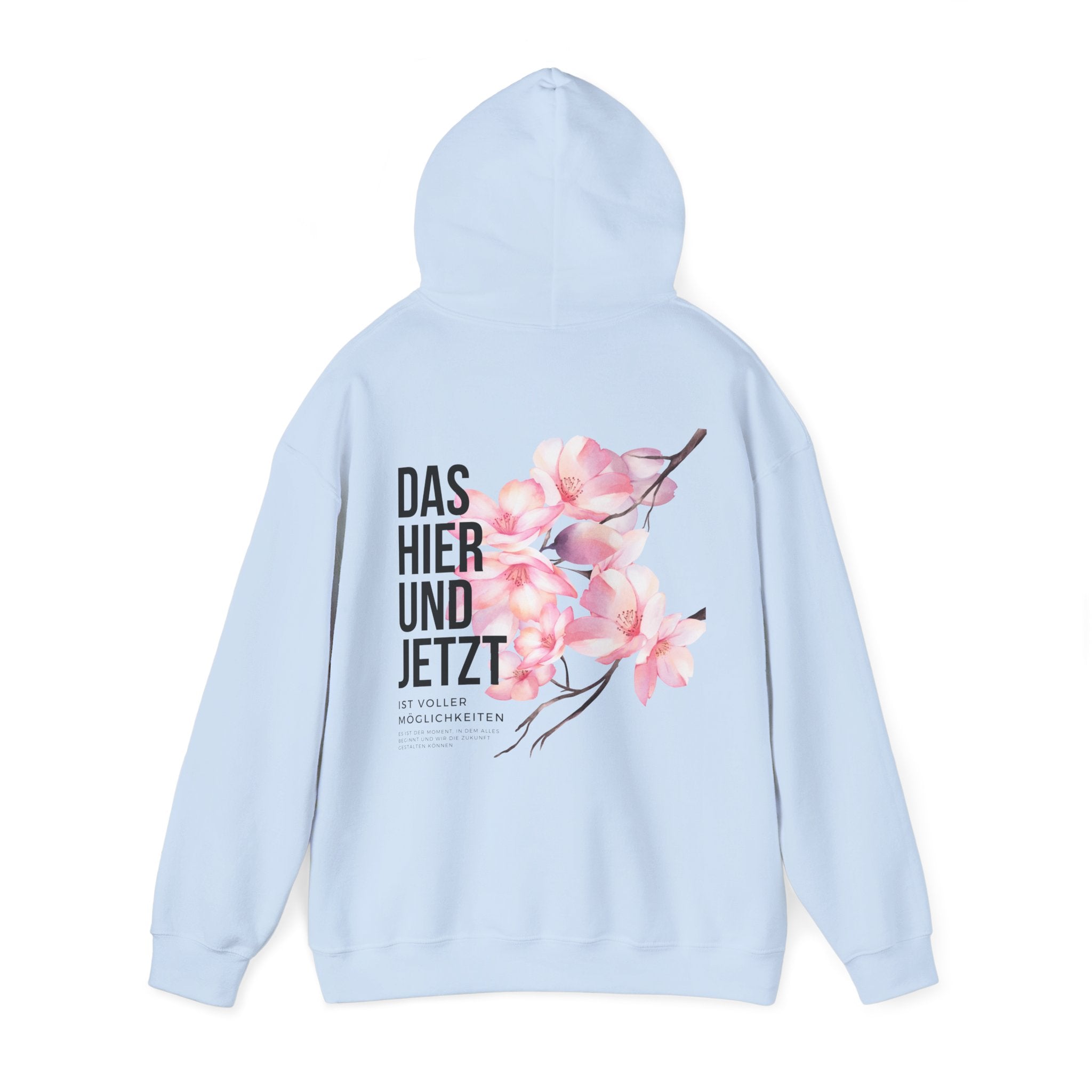 Unisex Hoodie mit Rückenprint „DAS HIER UND JETZT IST VOLLER MÖGLICHKEITEN“ – Hoodie mit inspirierender Botschaft