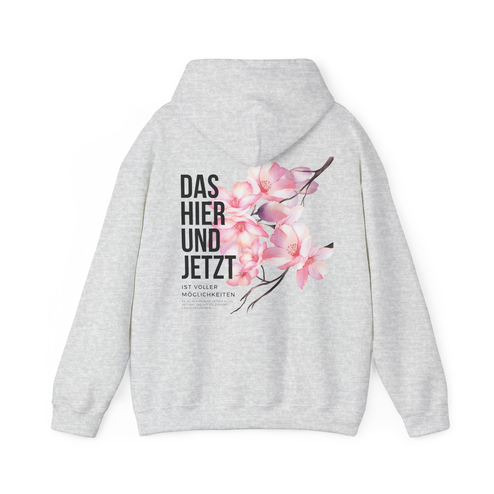 Unisex Hoodie mit Rückenprint „DAS HIER UND JETZT IST VOLLER MÖGLICHKEITEN“ – Hoodie mit inspirierender Botschaft